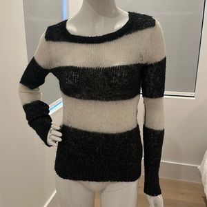 Sheer black and white striped Hurley sweater with glitter fiber.